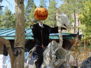 Headless horseman Halloween display with jack-o-lantern at Georgetown Loop Railroad Trick or Treat