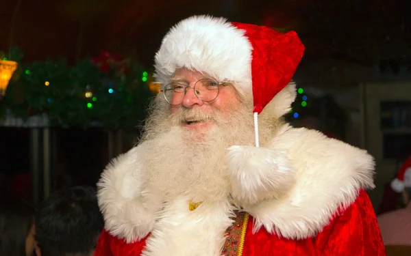 Smiling Santa Claus aboard Georgetown Loop Railroad Winter Holiday Train with Christmas decorations